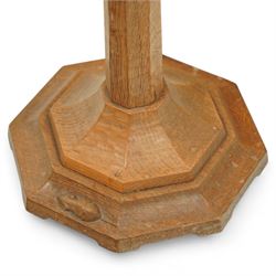 Mouseman - oak standard lamp, with octagonal tapering stem on stepped octagonal base, with signature carved mouse, by the workshop of Robert Thompson, Kilburn