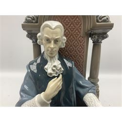 Lladro figure, Justice, modelled as a judge sat in a char, sculpted by Salvador Furió, with original box, no 5489, year issued 1988, year retired 1993, H34cm 