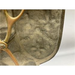 Cast iron fire companion set modelled as a knight in armour with fleur-de-lis shield and sword concealing fire poker, with brass tongs to reverse, raised upon stepped rectangular base, H55cm