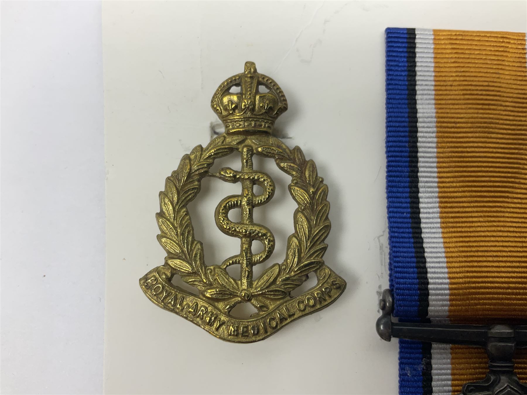 George V India General Service Medal with Afghanistan N.W.F. 1919 clasp and WW1 British War Medal awarded to 79561 Pte. R.D. Rowbottom R.A.M.C.; both with ribbons; card mounted with cap badge and Medical Corps cloth badge