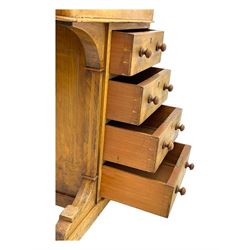 Early 19th century burr walnut Davenport desk, sloped leather-inset writing surface with brass gallery, fitted with an inkwell compartment and pen slot, four drawers to one side, raised on scrolled supports terminating in castors