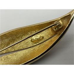 Christian Dior costume jewellery, comprising pair of pearlescent clip on earrings, enamel and paste leaf brooch and a pierced stylised leaf brooch, each stamped Chr.Dior Germany and in original boxes