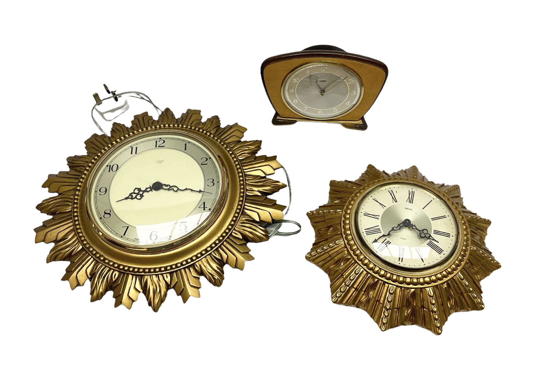 Two Smiths Sectric gilt sunburst wall clocks together Metamec Dereham wooden mantel clock, largest wall clock D35cm