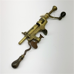 Two 19th century brass 12-bore cartridge making tools comprising bench mounting Bartram & Co Patent 'Nimrod' re-loader and J.C. Cocker Patent 5535 redecapper with turned wooden rammer (2)