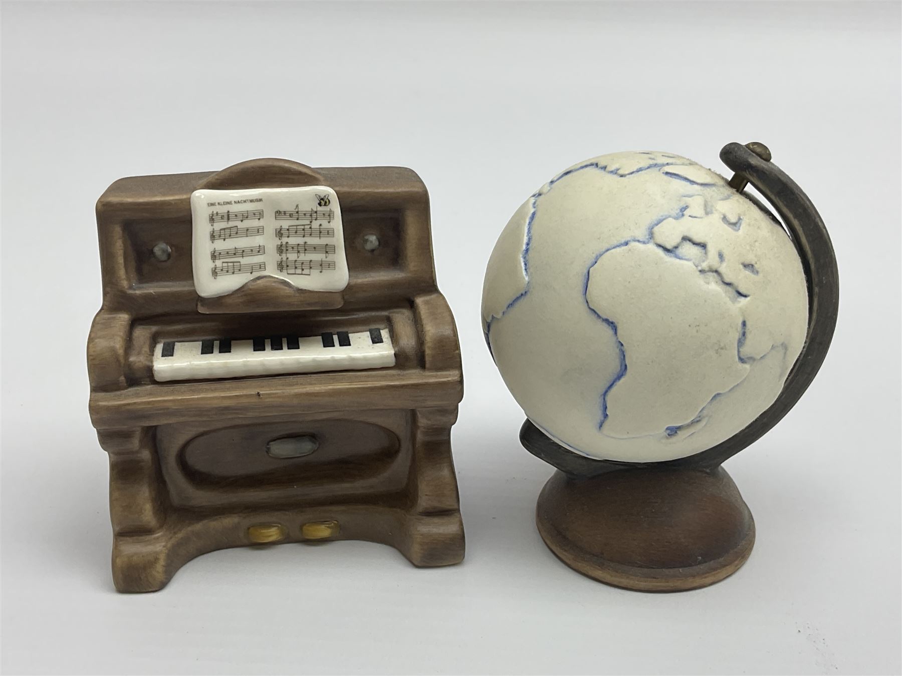 Thirty Hummel figures by Goebel, to include Saluting the Peacekeepers of Operation Joint Endeavor, on wooden plinth, Call to Glory, Celebrate with Song and Soldier Boy