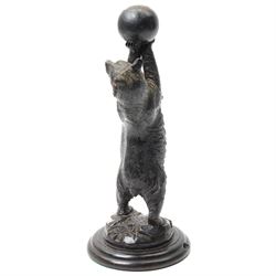 Black forest carving of a circus bear, holding aloft a ball, standing, H35cm