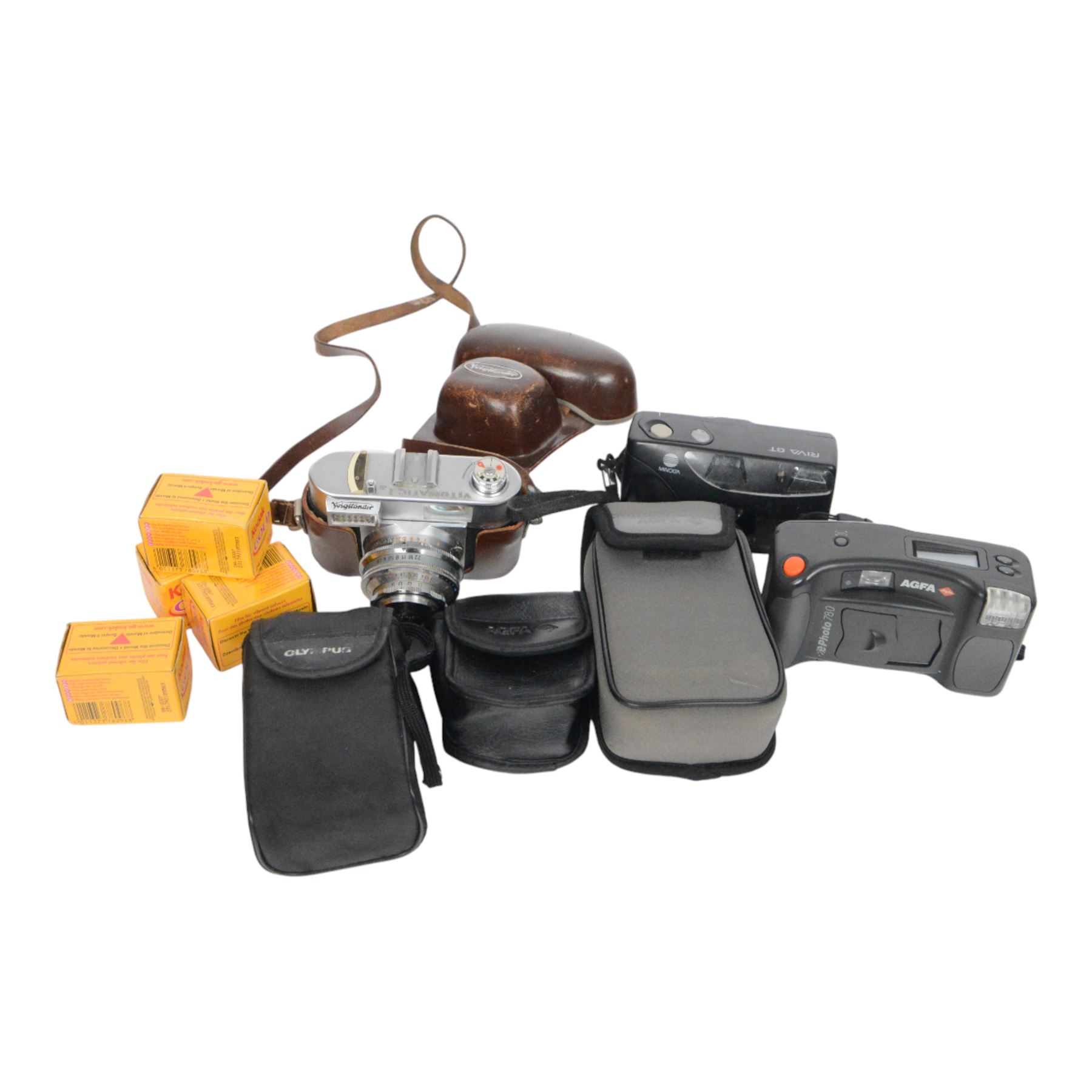 Collection of cameras, including Agfa 780, Minolta Riva GT, Olympus Trip XB3 and Voigtlander VITOMATIC Ia