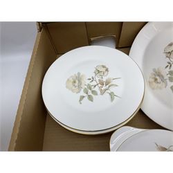 Royal Doulton Yorkshire Rose pattern tea and dinner wares, to include twelve cups, ten saucers, milk jug, eleven dinner plates, fourteen bowls, two covered tureens etc (67)
