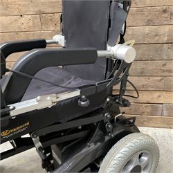 Permobil LSA Lifestand seated and standing wheelchair