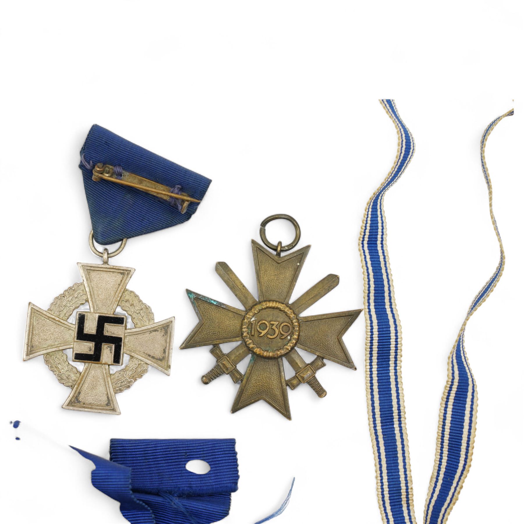 German Third Reich War Merit Cross, 1st class with swords, clasp marked '65', another without swords with citation and envelope of issue, 1914-18 Cross of Honour, Third Reich Mothers Cross, Faithful Service Cross and others
