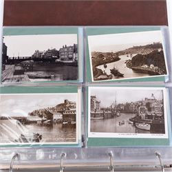 Two-hundred and thirty eight early 19th century to 20th century Whitby view postcards, including twenty-four early 19th century court cards, seventeen views of Whitby Abbey, forty depicting the fishing fleet and harbour, with a selection of cards providing a detailed study of the early 'Yards' the fisherman's dwellings around the harbour, all housed within a Stanley Gibbons Picture Postcard Album