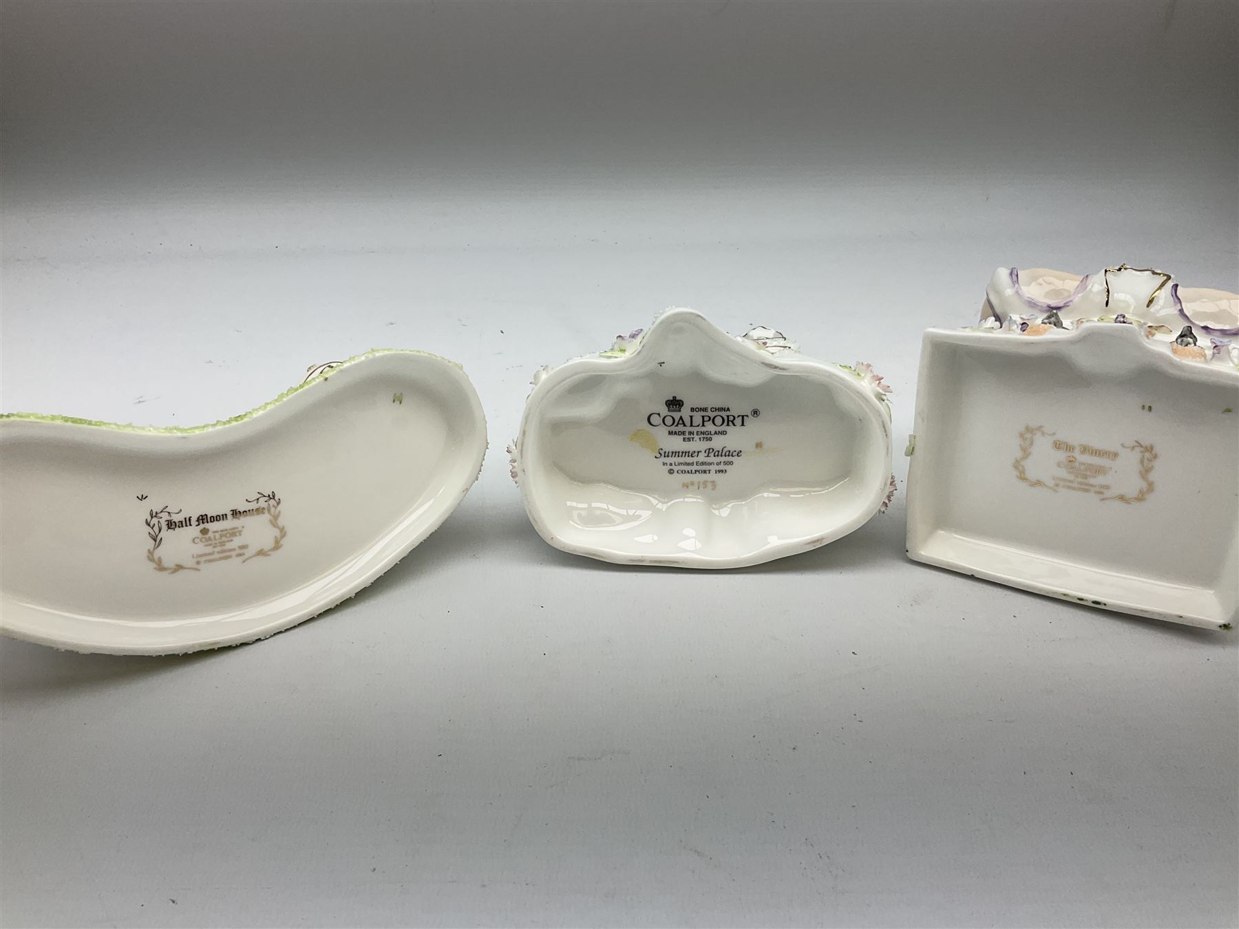 Twelve Coalport bone china pastille burner cottages, to include Fortune Towers, Summer Palace, The Vinery, Springtime Cottage, Dream Villa, Half Moon House, etc, all with original boxes and some with certificates 