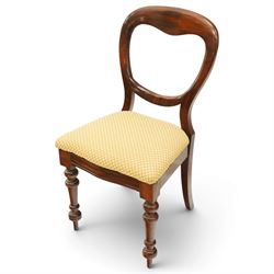 Set of eight mahogany balloon-back dining chairs, drop-in seats upholstered in yellow patterned fabric, raised on turned-front and rear-splayed supports
