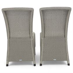 Neptune – Sheldrake limed oak extendable dining table and eight Havan loom chairs, the oval top in limed oak finish with four additional leaves extending the table to seat up to ten (Extends to cm), raised on turned legs with two additional centre supports, the matching Havan loom chairs finished in grey with cream upholstered seat covers (H 95cm, W 47cm, D 55cm)