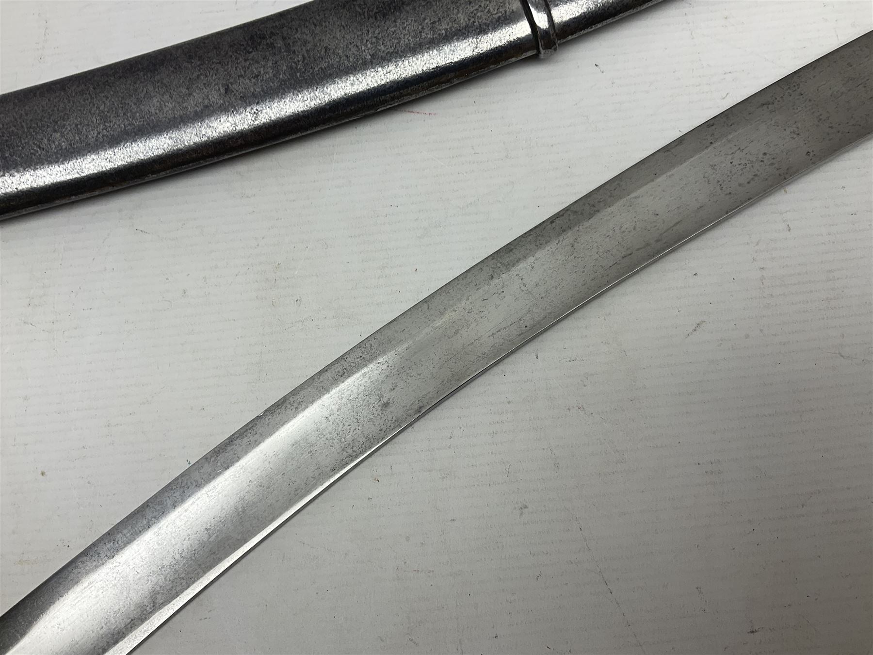 British 1796 Pattern Light Cavalry trooper's sword, the 84cm curving fullered blade stamped Hadley.1 to the back edge, steel hilt with knucklebow, D-shaped langets and leather grip; in polished steel scabbard stamped Osborn & Gunby Birmm. and W.R.16 ( ?16th Light Dragoons) with two suspension rings L100cm overall