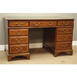  Reproduction mahogany twin pedestal desk, canted rectangular top with leather inset and banded in satinwood, eight drawers, on plinth base, W138cm, H78cm, D77cm  