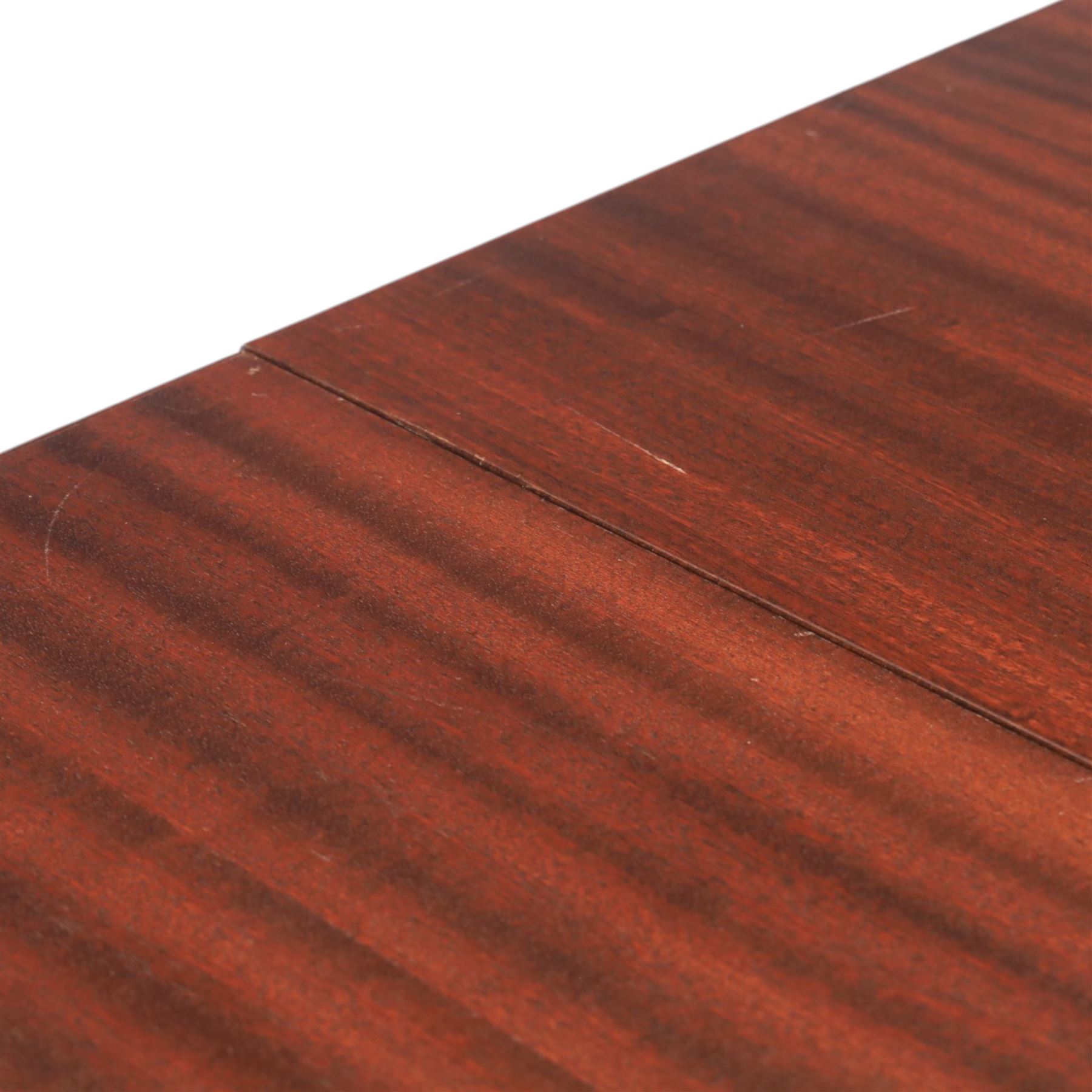 Mid-20th century mahogany extending dining table, with additional leaf, raised on square legs