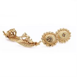 Pair of gold lily of the valley stud earrings and a pair of gold diamond chip stud earring...