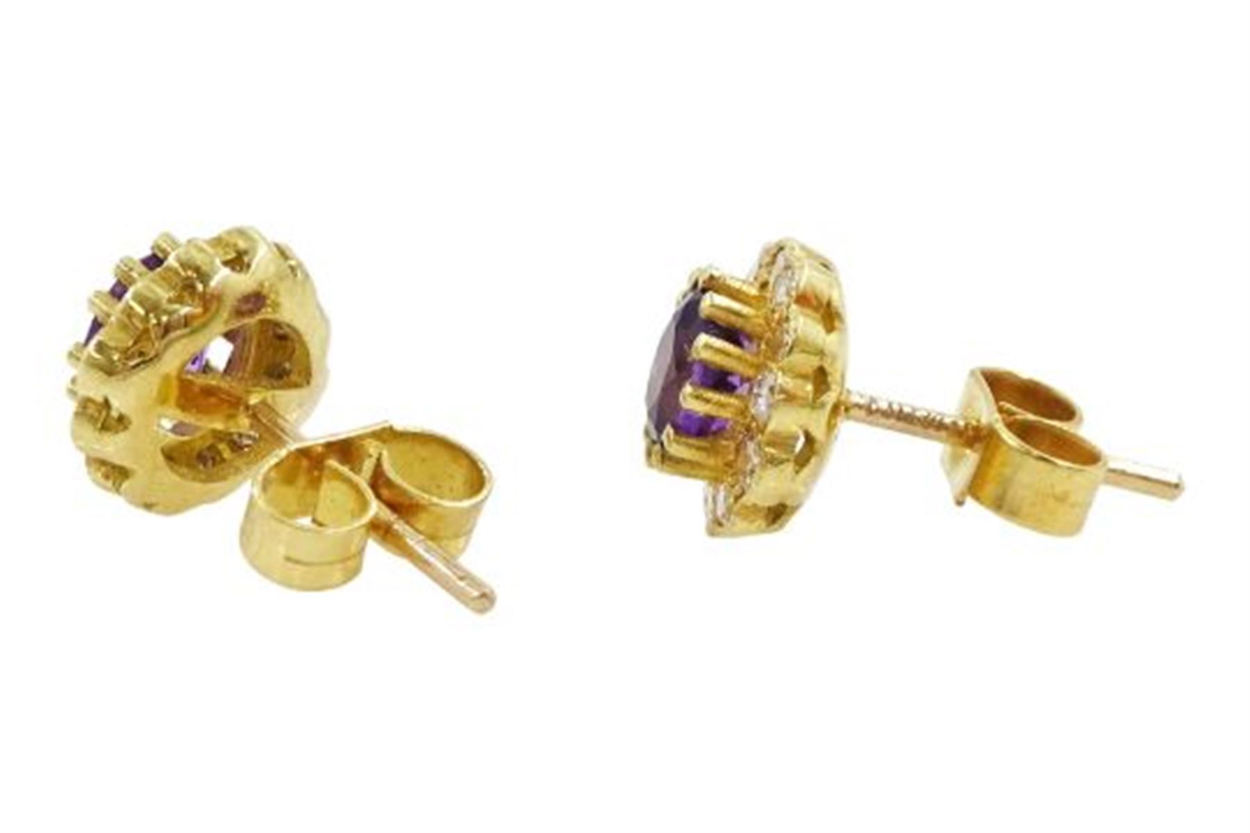 Pair of 18ct gold amethyst and diamond cluster stud earrings, hallmarked