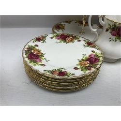 Royal Albert Old Country Roses pattern tea service for six, comprising teapot, sucrier, milk jug, dessert plates, one cake plate, one two tiered cake stand, salt and pepper pots and bud vase 