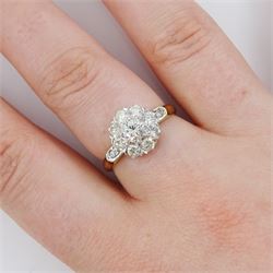 Gold round brilliant cut diamond flower head cluster ring, stamped 18ct, total diamond weight approx 0.90 carat