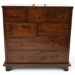 Willis & Gambier - 'Kerala' pair of chest, five short legs over two long drawers, raised on a plinth, above splayed legs