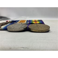 WW1 group of three medals comprising 1914-15 Star awarded to 536 Pte. T. Hall North'd Yeo. and British War Medal and Victory Medal with oak leaves awarded to 2.Lieut. T. Hall; with ribbons; displayed on board for wearing; some biographical details