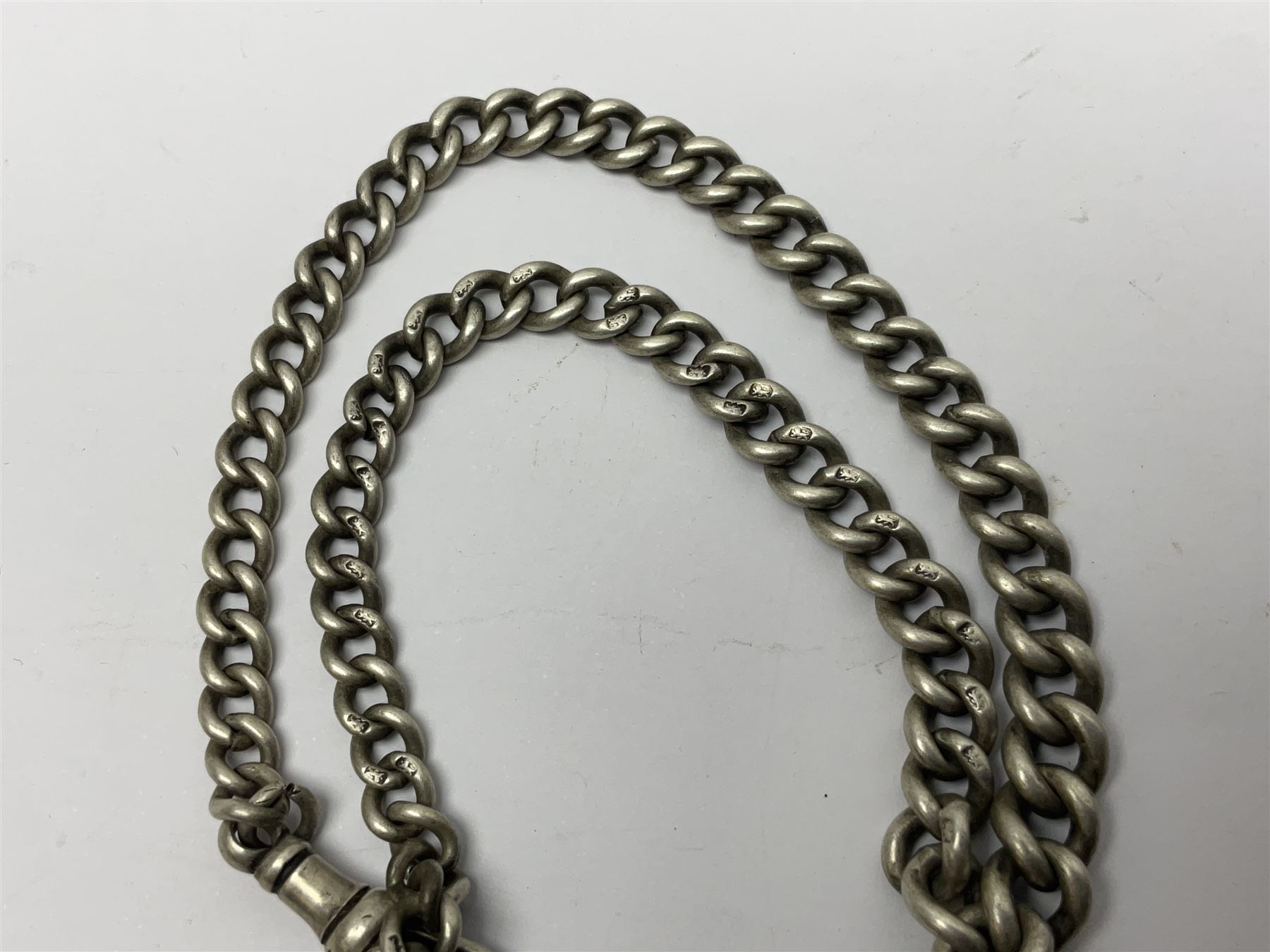 WW1 group of three medals comprising 1914-15 Star awarded to L-Cpl. W.J. Horspool R.War.R., British War Medal and Victory Medal awarded to A. Cpl. W.J. Horspool R.War.R.; WW1 British War Medal awarded to 3-8755 W.O.Cl.2. S. Paterson North'd Fus.; and hallmarked silver and enamel Northumberland Football Association Junior Cup Runners Up fob 1921-22 on silver chain (5)