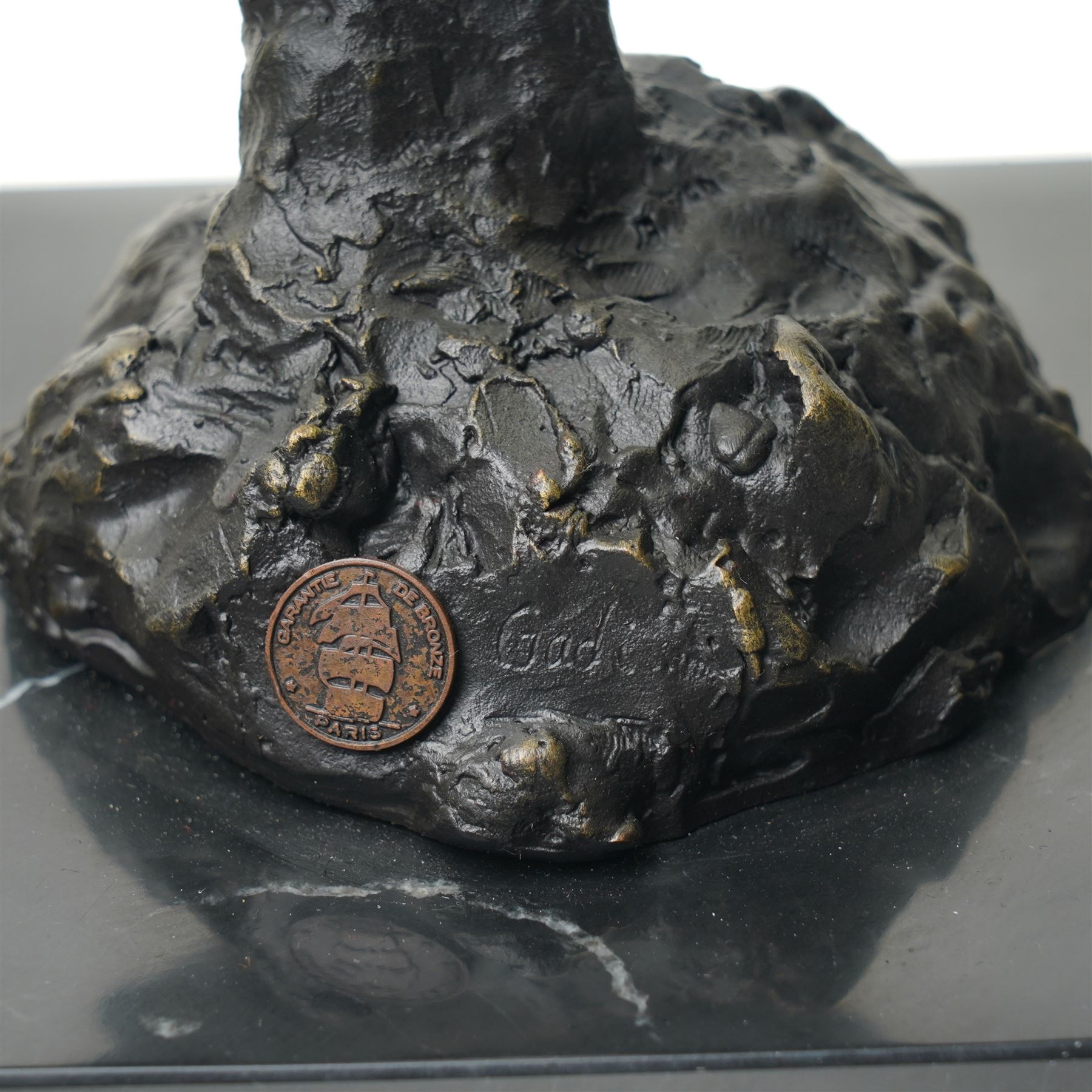 Stylised horse head, bronze, signed Gadi and bearing foundry mark, upon black stone square plinth, overall H41cm