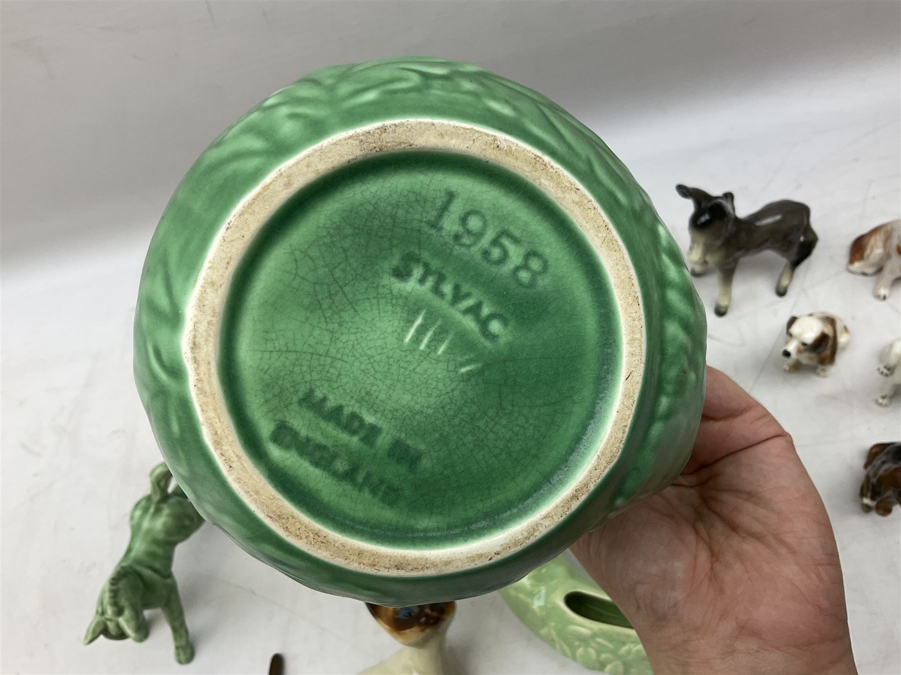 Sylvac blue rabbit no. 1067, green horse no. 1334, jug with squirrel handle no. 1958 (a/f), Royal Doulton dog figure, and other ceramics in one box