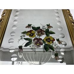 Pair of gilt framed wall mirrors, the etched bevelled plate painted with a vase of flowers, H61cm