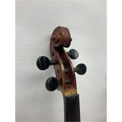 Late 19th century French three-quarter size 'Conservatory' violin with 34cm two-piece maple back and ribs and spruce top, the peg box inscribed 'Conservatory Violin Straduari', bears label 'Antonius Stradiuarius Cremonensis Faciebat Anno 1721' L55.5cm overall; in ebonised wooden 'coffin' case; and Saxony violin c1900 with 36cm two-piece maple back and ribs and spruce top; bears label 'Antonius Stradivarius Cremonensis Faciebat Anno 17**' L59cm overall; in carrying case (2)