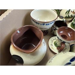 Collection of Torquay and similar Motto ware, including jugs, candlesticks, twin handled mug etc 