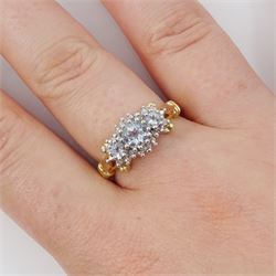 9ct gold aquamarine and diamond cluster ring, three round cut aquamarines, with diamond chip surround and scroll design shoulders, hallmarked