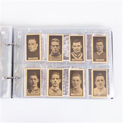 Collection of Edwardian and later Football related trading and cigarette cards, including forty-nine of fifty 1906 Ogden's Football Club Colours, 1922 PALS Footall series, ninety of one hundred 1925 Gallaher Famous Footballers, complete set of forty-four 1926 Ogden's Captains of Association Football Clubs and Colours, complete set of fifty 1927 Players Football Caricatures by MAC,  complete set of fifty 1927 Players Football Caricatures by RIP,  complete set of fifty 1930 Players Association Cup Winners, complete set of 50 1933 Ogdens AFC Nicknames etc, housed in brown cigarette card album