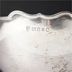 Silver circular bowl with crimped rim and short pedestal foot D14cm London 1935 Maker  C S Harris & Sons Ltd  