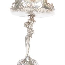 WMF figural centre piece the pedestal in the form of a woman, holding flower bud, the bowl decorate with vine leaves and berries, mark stamped to base, H38cm