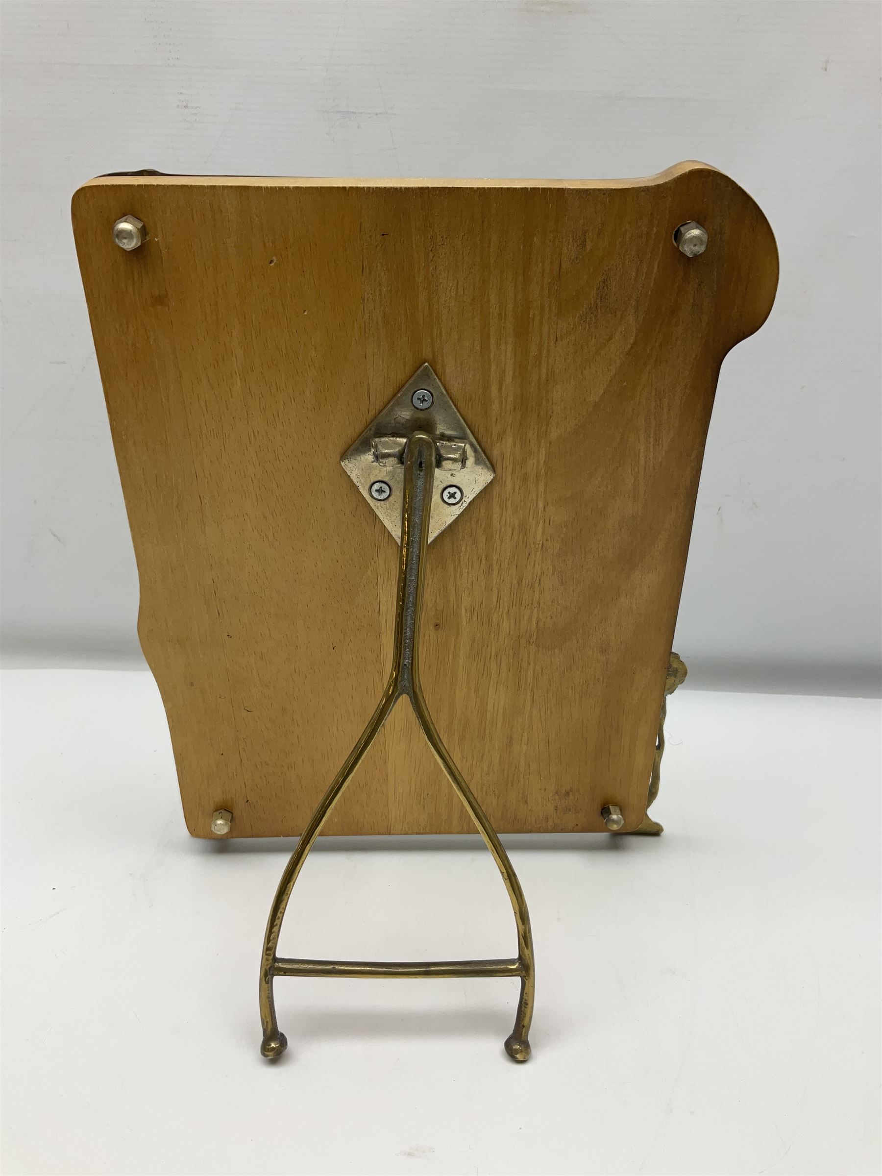 Art Nouveau style mirror in the manner of WMF, decorated with a female figure and floral motifs, the easel support verso with spurious WMF, H35cm