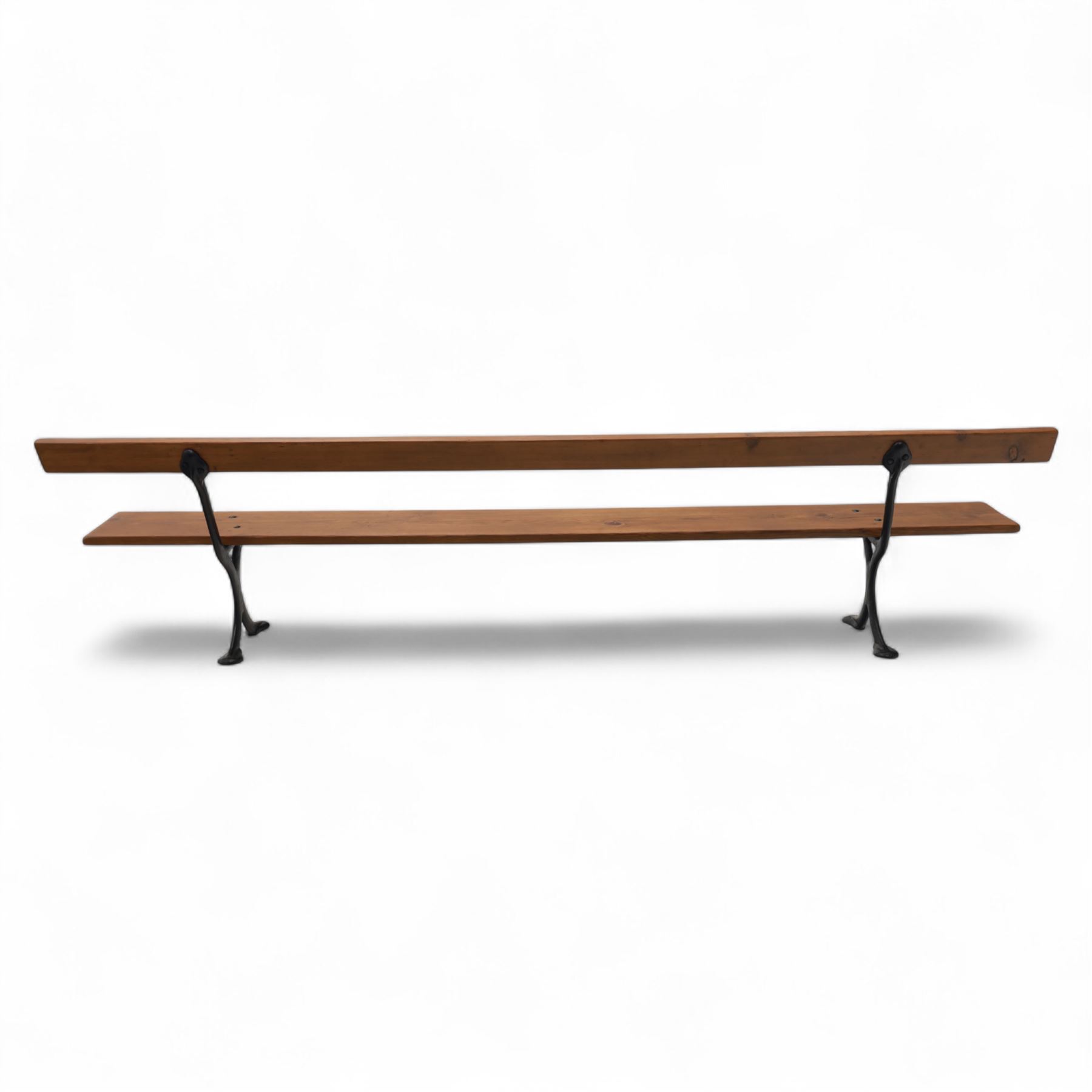 Pine garden bench, with stained and weatherproof varnish, single slat pine seat and back, raised on curved black cast iron supports