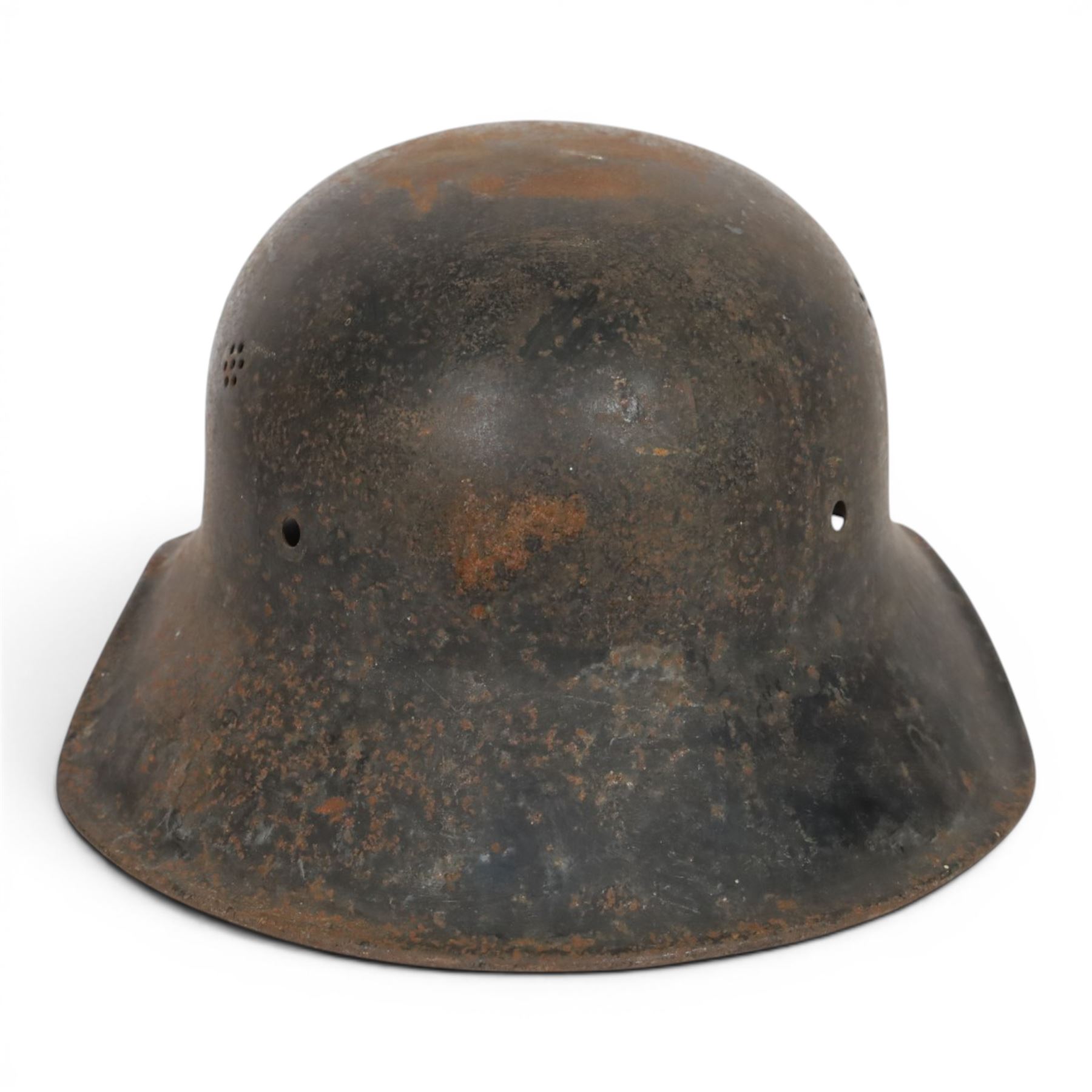WWII German Third Reich M1940 helmet, with desert camouflage, the left inner brim stamped SE64, the back inner brim stamped 506, with leather eight tongue liner, together with German M34 helmet