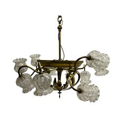 Mid-20th century brass lightolier or light fitting, the scrolling foliate branches connected with a central ring, terminating in ten tulip shaped cut glass sades, pointed terminal beneath