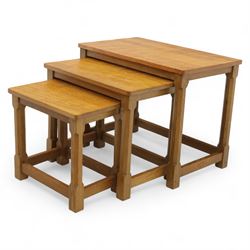 David 'Oakleafman' Langstaff - oak nest of three tables, each with a rectangular adzed top, with signature leaf motif on the bottom stretcher, from the workshop of David Langstaff, Easingwold, Yorkshire