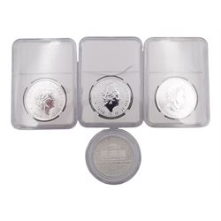 Four 1 ounce fine silver coins, comprising Canada 2019 five dollars, Austria 2020 one and a half euro, Great Britain 2021 Britannia and 2021 'George and the Dragon' two pound coins
