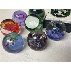 Twelve Caithness glass paperweights, to include Pastel, Mooncrystal and Fiesta, together with Baccarat 'The Princess Anne' paperweight and two Mdina examples (15)