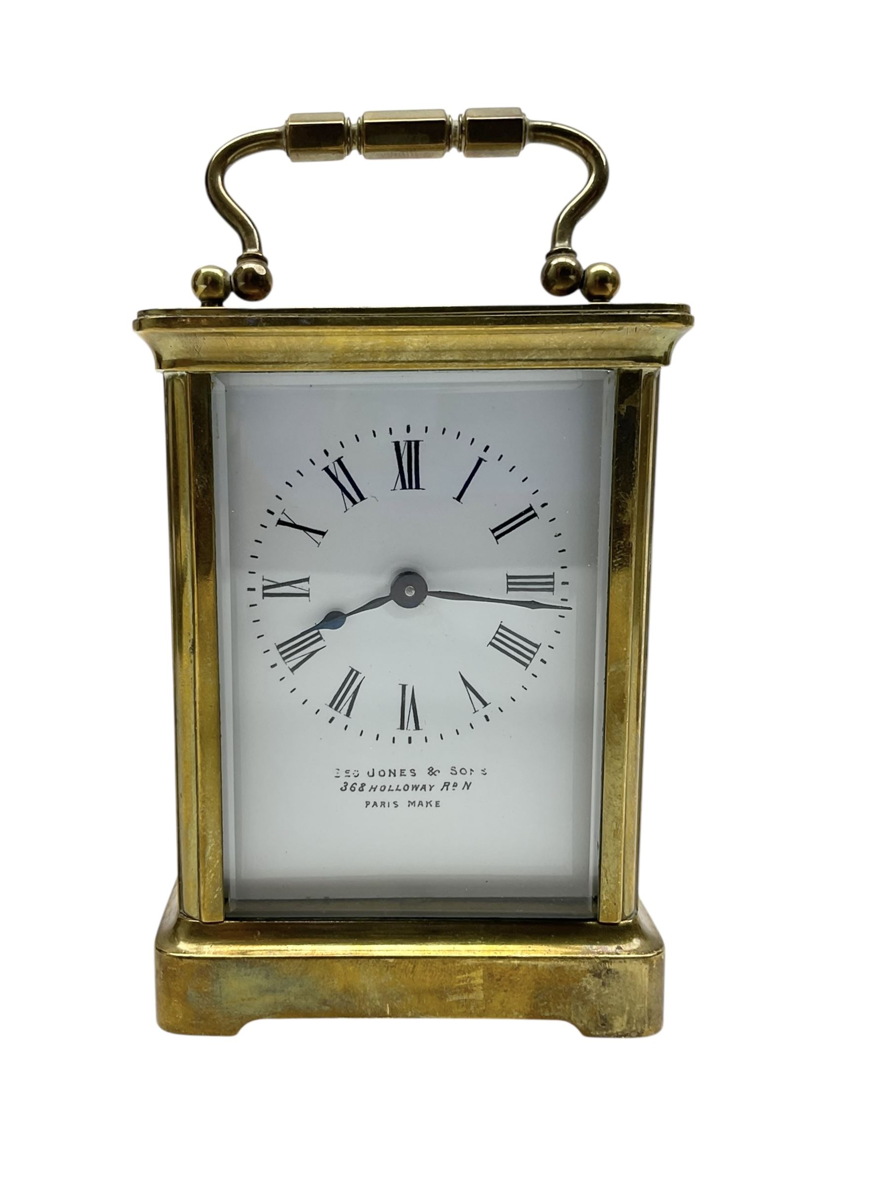 Two French early 20th century timepiece carriage clocks and a traveling case, both clocks with enamel dials, Roman numerals and steel hands, both with cylinder platform escapements.