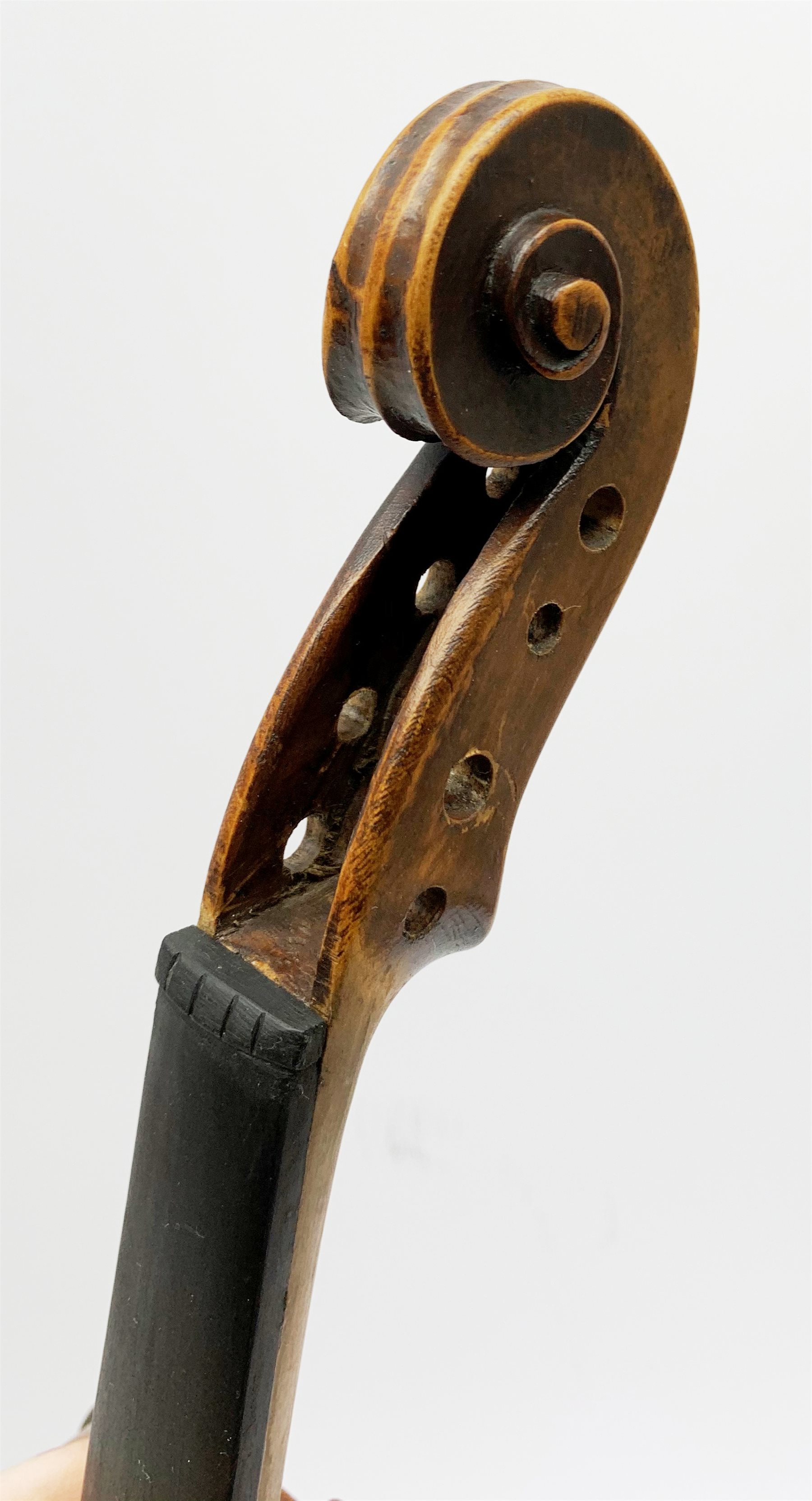  Late 19th century German violin for completion with 36cm one-piece maple back and ribs and spruce top, bears label Copie De Albani Palermo 1633, 59cm overall together with three books on violin construction, restoration and varnishing  