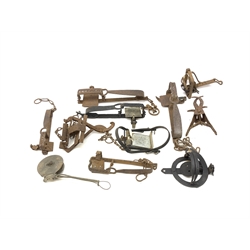 Eleven gin and animal traps including Fenn Mark 1 rabbit trap, 'The Imbra Trap', hawk trap with flat jaws, mole traps etc. Auctioneer's Note: These traps are sold as artefacts for ornamental purposes only as the use of some of them is illegal.