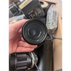 Collection of camera lenses, including Tamron, Praktica, Minolta and Soligor examples