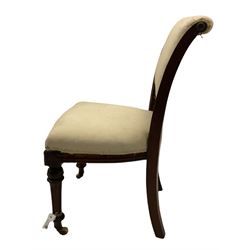Pair Victorian mahogany side chairs, curved and moulded upright back rails, shaped seats, on turned and fluted supports with brass and ceramic castors