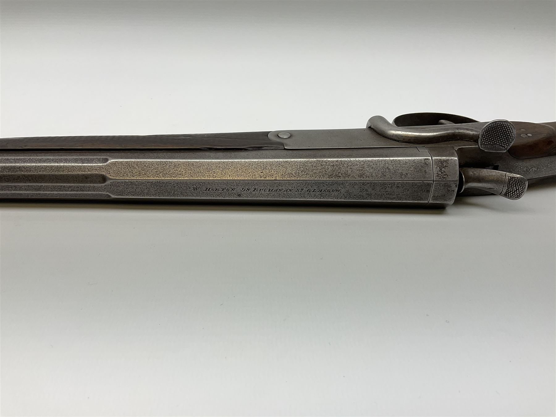 W. Horton 98 Buchanan Street Glasgow 20-bore single barrel centre hammer sporting gun, 71cm octagonal to round barrel with side lever opening, walnut stock with chequered grip and fore-end and steel butt plate, serial no.40334, L110cm SHOTGUN CERTIFICATE REQUIRED